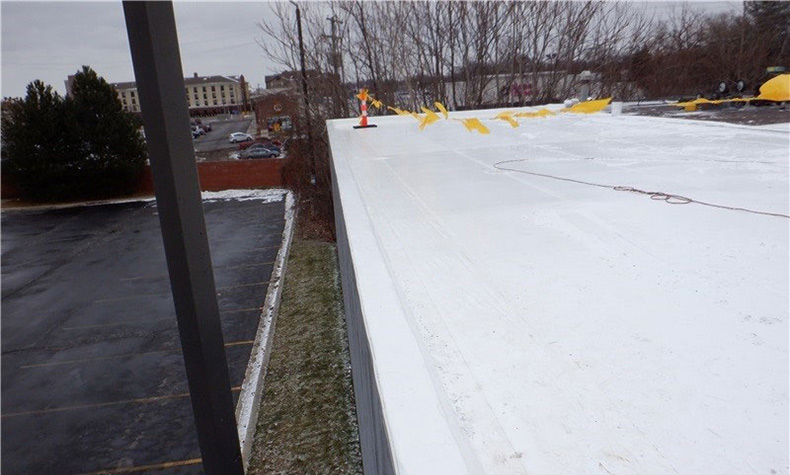 How Weather in Michigan Impacts Commercial Roofing Systems